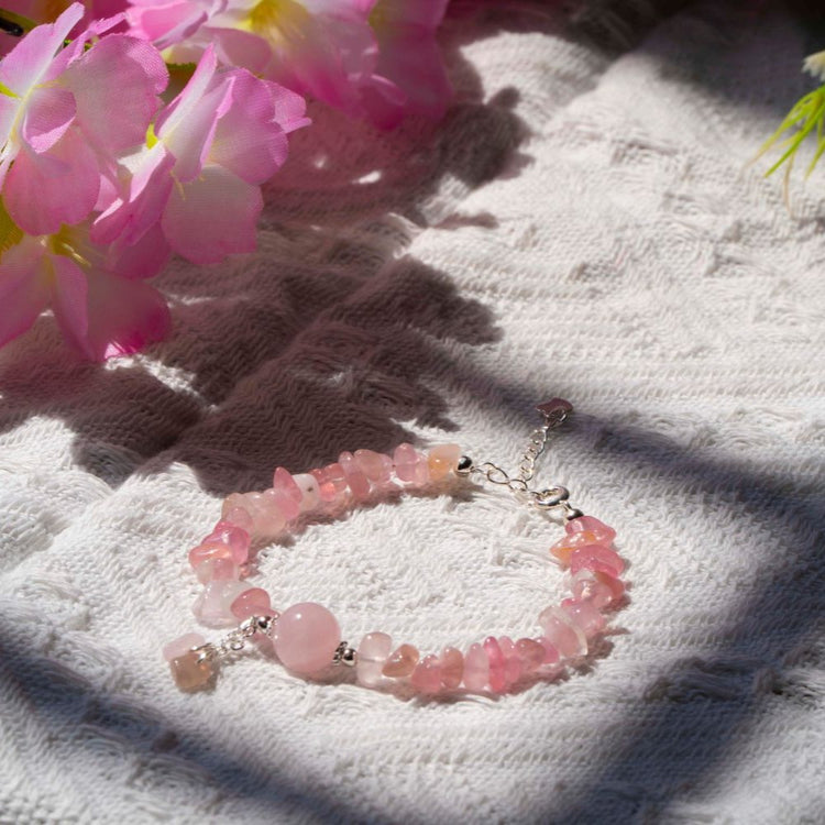 Stunning pink crystal bracelet, or rose quartz bracelet, with a sophisticated design.